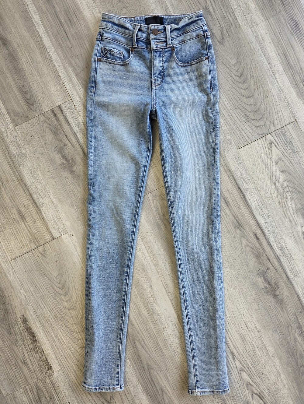 Buckle Light Wash Blue Skinny Jeans